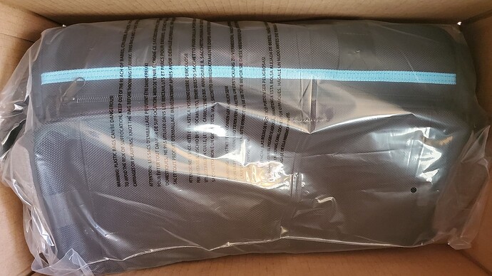 Flight bag wrapped in plastic