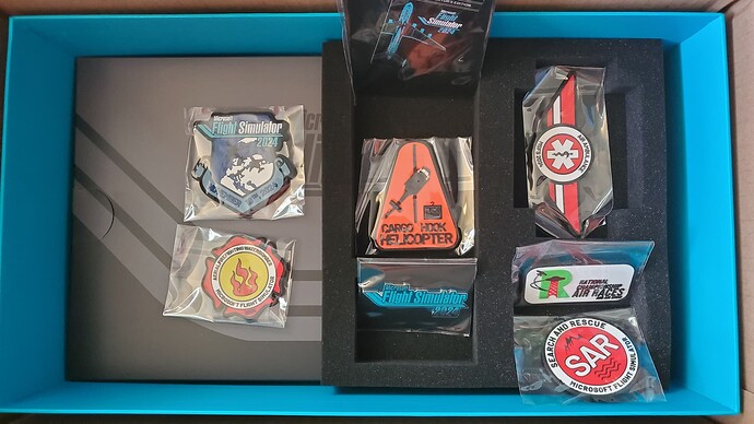 Keychain, pin, patches spread out